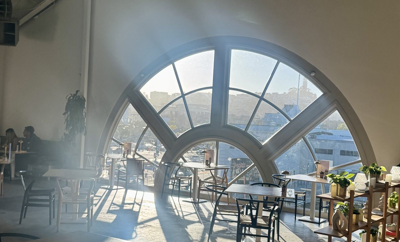 A quiet arched window seat where the letters get written